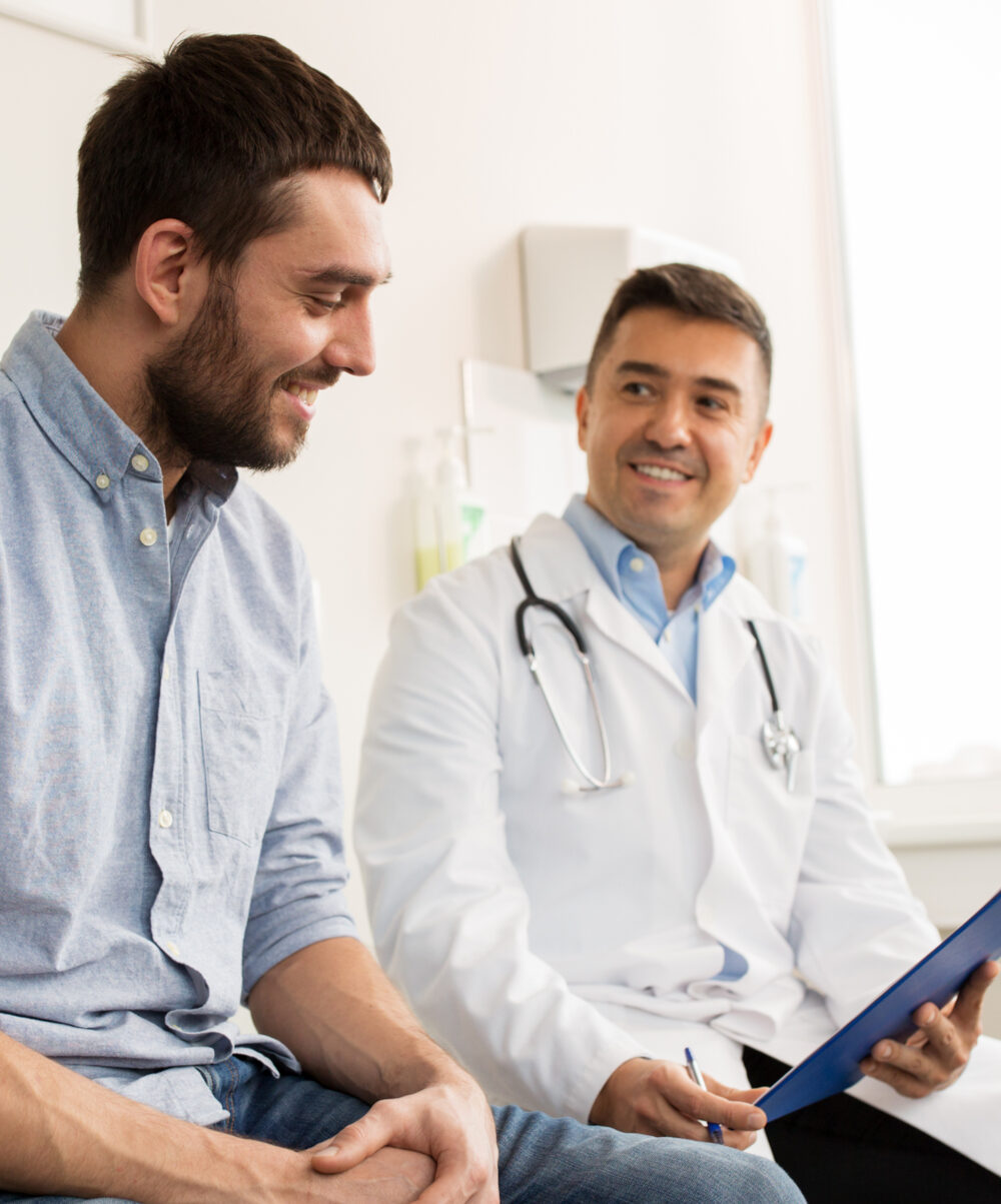 Doctor talking with patient